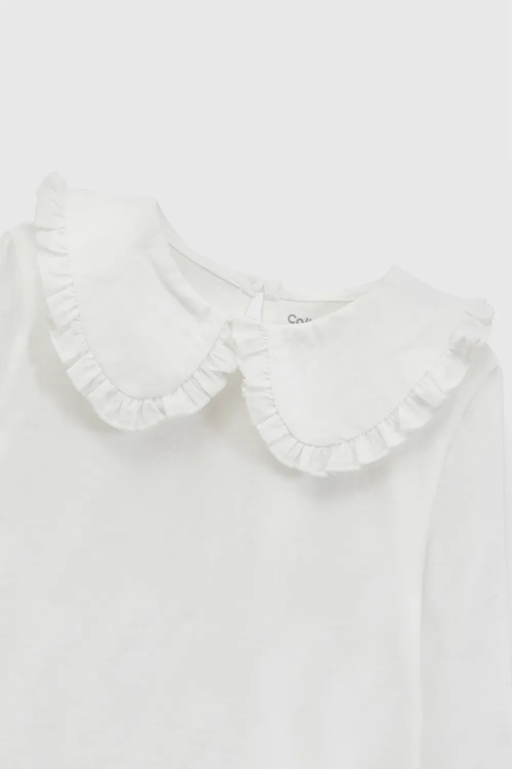 Polera cuello bobo niña blanca