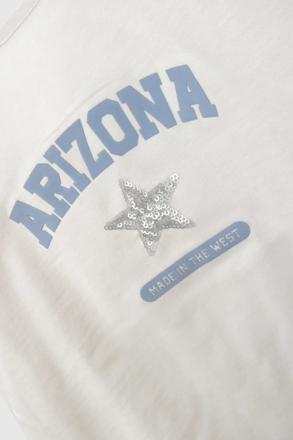 Polera sin hombro arizona niña beige